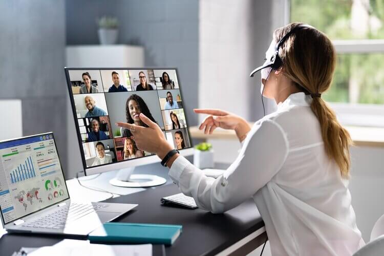 HR professional trying to manage a reoccuring organisational issue on a Teams call with colleagues